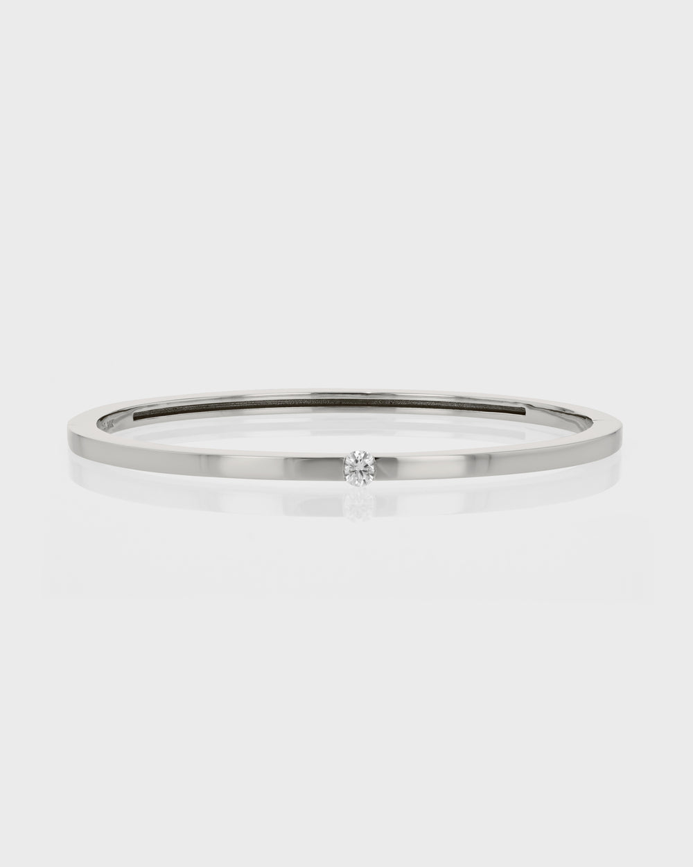 Round Suspense Bangle by Sarah & Sebastian